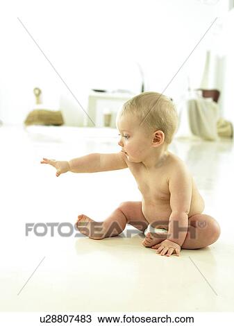 Baby playing with bubbles View Large Photo Image Stock Image - Baby playing with bubbles. Fotosearch