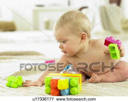 baby playing with blocks