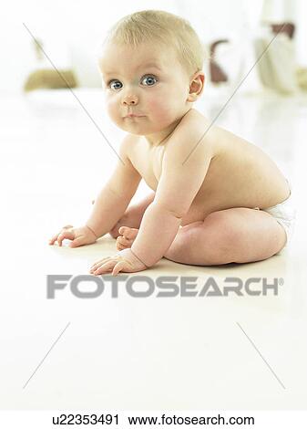 Stock Image - Baby sitting . Fotosearch