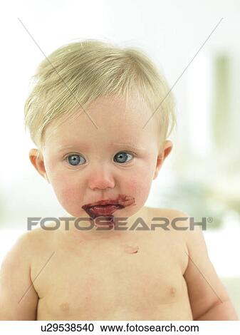 Baby with chocolate mess on face View Large Photo Image Stock Image - Baby with chocolate mess on face. Fotosearch
