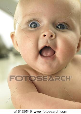 Baby with wide eyes and mouth open View Large Photo Image Stock Photo - Baby with wide eyes and mouth open. Fotosearch