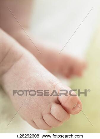 Stock Photo - Baby's bare feet. Fotosearch