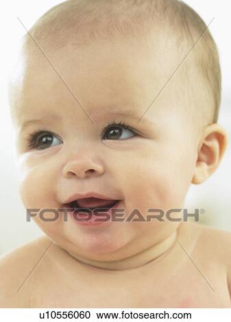 Baby's face close up laughing View Large Photo Image Stock Image - Baby's face close up laughing. Fotosearch