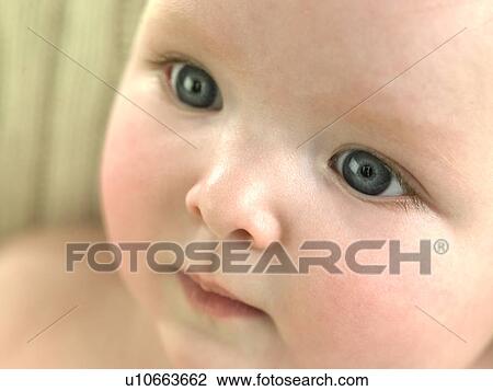 Stock Image - Baby's face close up. Fotosearch