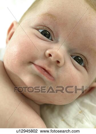 Baby's face close up View Large Photo Image Stock Image - Baby's face close up. Fotosearch