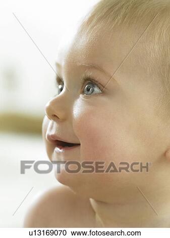 Stock Image - Baby's face close up. Fotosearch