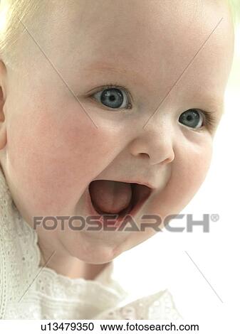 Baby's face close up View Large Photo Image Stock Image - Baby's face close up. Fotosearch