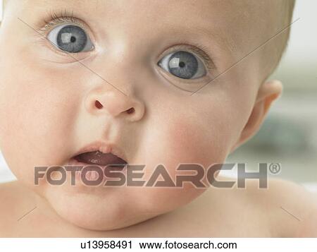Baby's face close up View Large Photo Image Stock Image - Baby's face close up. Fotosearch