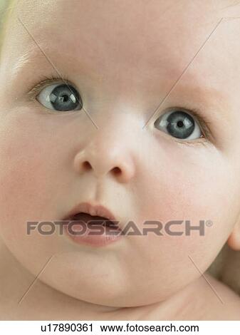 Stock Image - Baby's face close up. Fotosearch