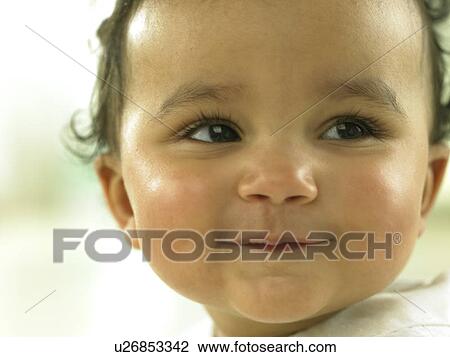 Baby's face close up View Large Photo Image Stock Image - Baby's face close up. Fotosearch