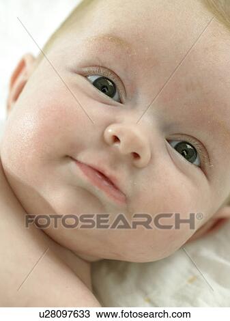 Baby's face close up View Large Photo Image Stock Image - Baby's face close up. Fotosearch