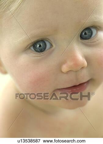 Stock Photo - Baby's face close up. Fotosearch