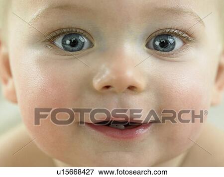 Stock Photo - Baby's face close up. Fotosearch