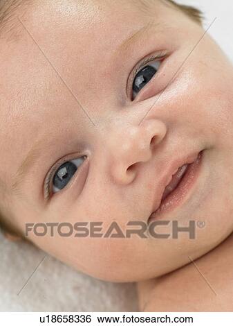 Baby's face close up View Large Photo Image Stock Photograph - Baby's face close up. Fotosearch
