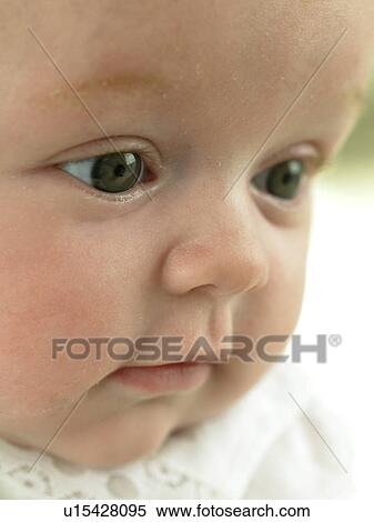 Baby's face close up View Large Photo Image Stock Photography - Baby's face close up. Fotosearch