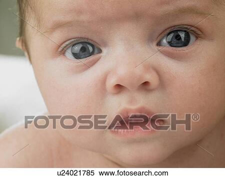 Baby's face close up View Large Photo Image Stock Photography - Baby's face close up. Fotosearch