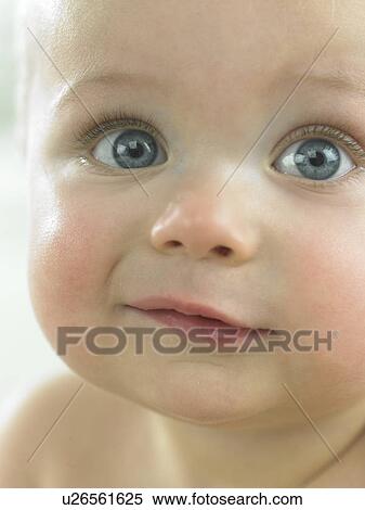 Baby's face close up View Large Photo Image Stock Photography - Baby's face close up. Fotosearch