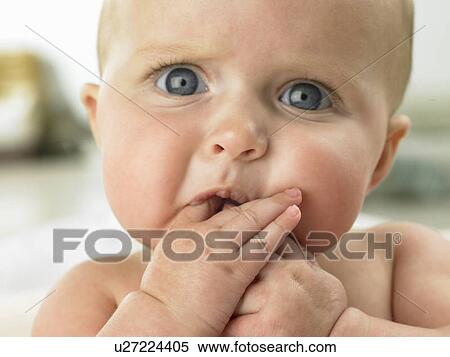 Baby's face close up View Large Photo Image Stock Photography - Baby's face close up. Fotosearch
