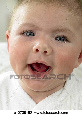 Baby's face close up yawning View Large Photo Image Stock Image - Baby's face close up yawning. Fotosearch