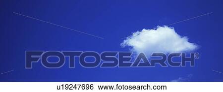 Stock Photograph - Blue skies with cloud. Fotosearch