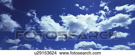 Blue skies with clouds View Large Photo Image Picture - Blue skies with clouds. Fotosearch