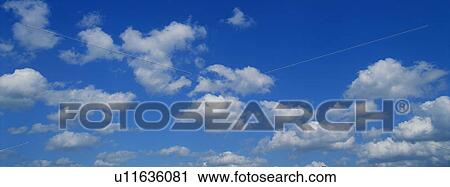 Blue skies with clouds View Large Photo Image Stock Image - Blue skies with clouds. Fotosearch