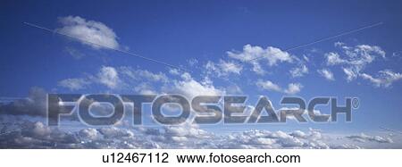 Stock Image - Blue skies with clouds. Fotosearch