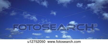 Stock Image - Blue skies with clouds. Fotosearch