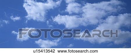 Stock Image - Blue skies with clouds. Fotosearch