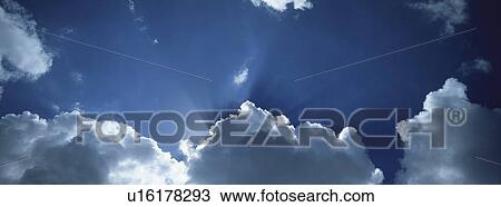 Blue skies with clouds View Large Photo Image Stock Image - Blue skies with clouds. Fotosearch