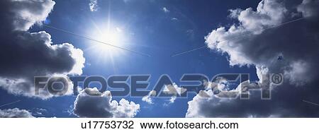 Stock Image - Blue skies with clouds. Fotosearch