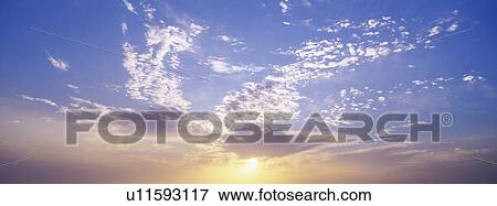 Stock Photo - Blue skies with clouds. Fotosearch