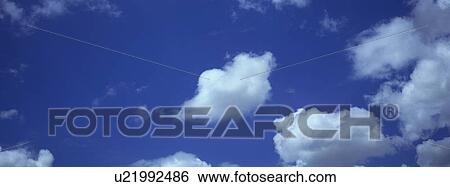 Stock Photograph - Blue skies with clouds. Fotosearch