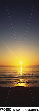 Beach at dusk View Large Photo Image Stock Image - Beach at dusk. Fotosearch