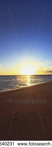 Beach shoreline at dusk View Large Photo Image Stock Image - Beach shoreline at dusk. Fotosearch