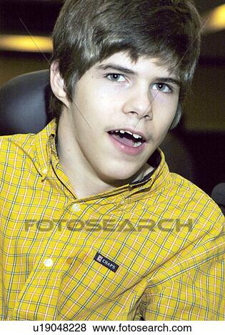 Young man with severe/profound mental retardation. View Large Photo Image Stock Photo - Young man with severe/profound mental retardation.. Fotosearch