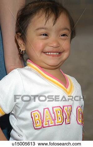 Adorable little girl with Down's Syndrome as happy as she can be. View Large Photo Image Stock Image - Adorable little girl with Down's Syndrome as happy as she can be.. Fotosearch