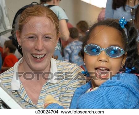 Close up of two girls having a great time. View Large Photo Image Picture - Close up of two girls having a great time.. Fotosearch