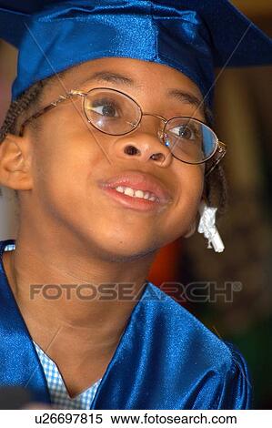 Little girl with disabilities smiling on her big day û graduation from pre-school. View Large Photo Image Stock Photography - Little girl with disabilities smiling on her big day û graduation from pre-school.. Fotosearch
