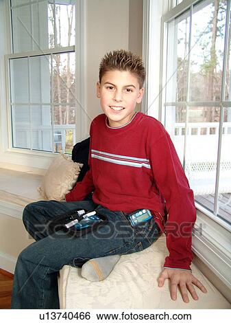 Young boy shows his insulin testing kit. View Large Photo Image Stock Photograph - Young boy shows his insulin testing kit.. Fotosearch