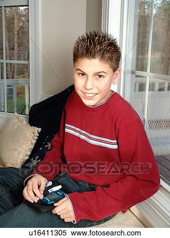 Young boy takes an insulin reading. View Large Photo Image Stock Photography - Young boy takes an insulin reading.. Fotosearch