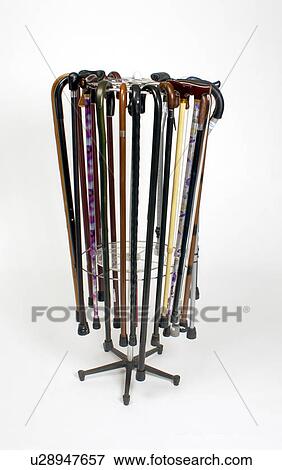 Stock Photo - A variety of canes displayed on a cane stand.. Fotosearch