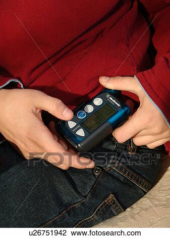 A young boy reads the results of an insulin test. View Large Photo Image Stock Image - A young boy reads the results of an insulin test.. Fotosearch