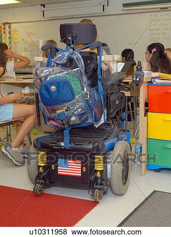 Rear view of a large and complex motorized wheelchair. View Large Photo Image Stock Photo - Rear view of a large and complex motorized wheelchair.. Fotosearch