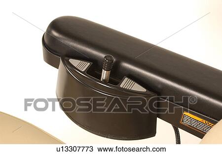 Stock Image - Toggle switch to operate the forward and reverse function on a scooter.. Fotosearch