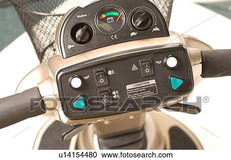 Stock Image - View of the control panel for a scooter.. Fotosearch