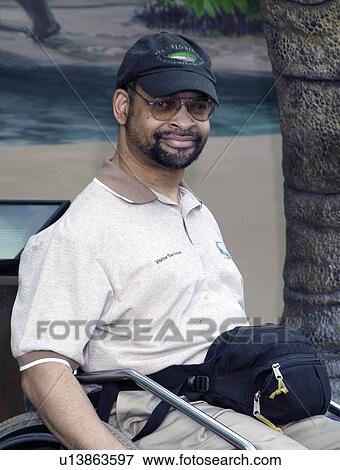Smiling face of a man with disabilities. View Large Photo Image Stock Photo - Smiling face of a man with disabilities.. Fotosearch