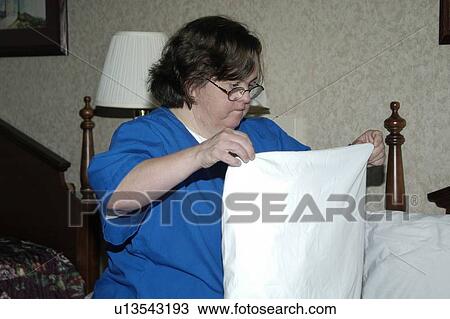 Woman working cleaning a hotel room View Large Photo Image Stock Image - Woman working cleaning a hotel room. Fotosearch