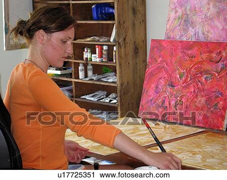 Young artist (wheelchair user) paints in her studio. View Large Photo Image Stock Image - Young artist (wheelchair user) paints in her studio.. Fotosearch