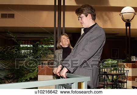 Young man with intellectual disabilities having a great time with is mother in a hotel. View Large Photo Image Stock Image - Young man with intellectual disabilities having a great time with is mother in a hotel.. Fotosearch